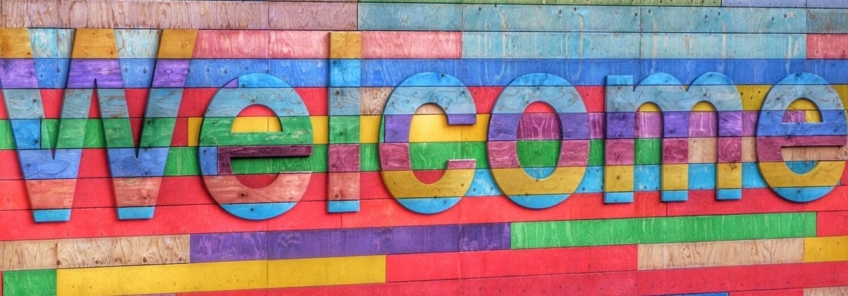 Ein Schrift auf einer Wand: Welcome